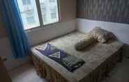 Bedroom 6 Daddy's Room Apartemen City Park