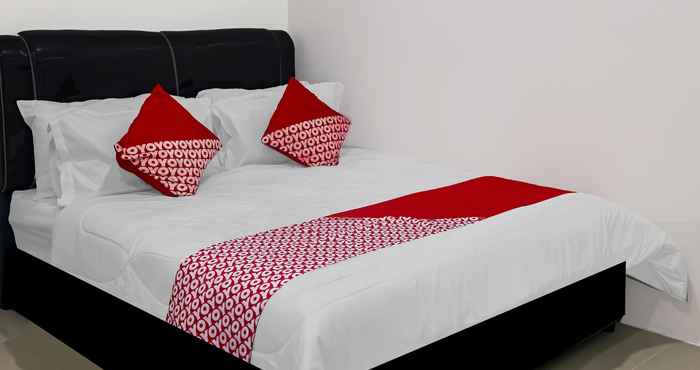 Kamar Tidur OYO 90609 Mimi & Coco Homestay