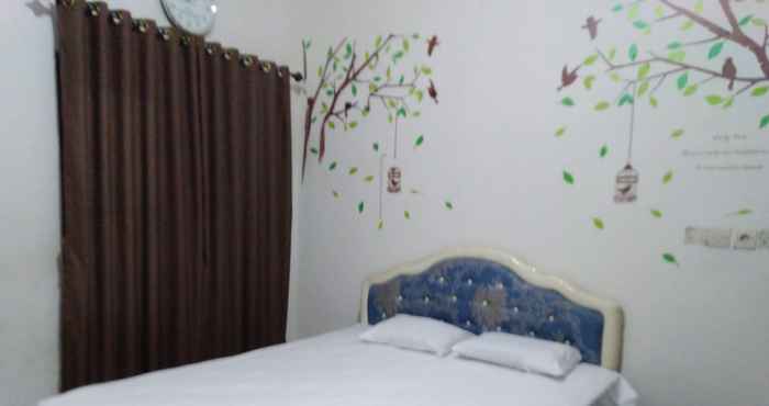 ห้องนอน OYO 90614 Spring Homestay