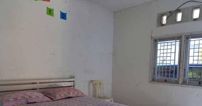 Kamar Tidur OYO 90616 Jojo Residence Syariah