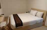 Bedroom 5 Hotel Syariah 99 by VRV