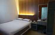 ห้องนอน 4 J & L Inn Semarang