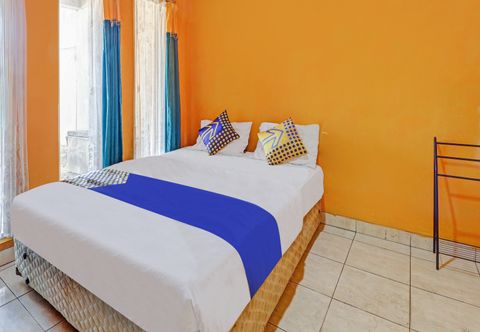 Bedroom SPOT ON 90632 Hotel Pelangi Indah Paskal