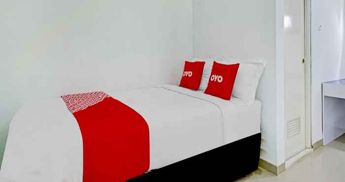 Kamar Tidur OYO 90630 The Town Tavern