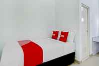 Kamar Tidur OYO 90630 The Town Tavern