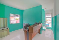 Lobi 7 OYO 90637 Rumah Ni Karo