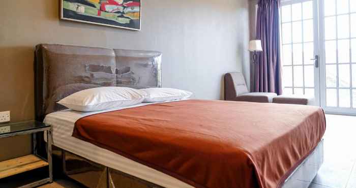 Bilik Tidur OYO 91252 Graceland Inn