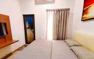 Bilik Tidur 4 OYO 90336 Sungai Rengit City Resort 1