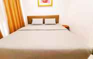 Bedroom 5 OYO 90337 Sungai Rengit City Resort 3