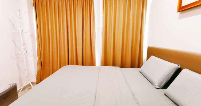 Bedroom OYO 90337 Sungai Rengit City Resort 3