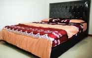 Kamar Tidur 2 OYO Home 90197 Art Homestay