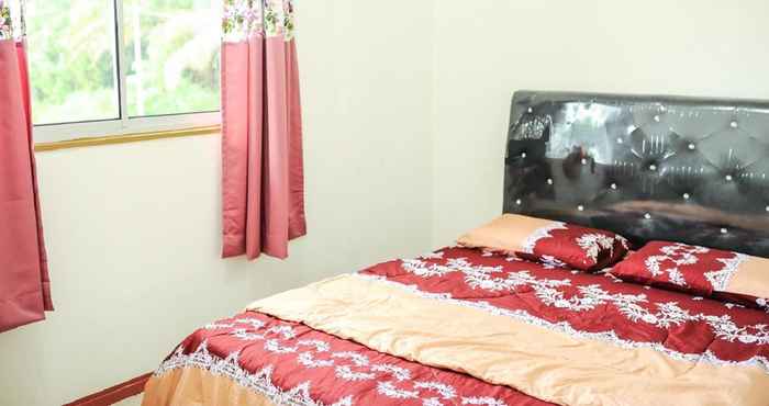 Kamar Tidur OYO Home 90197 Art Homestay