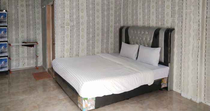 Bilik Tidur OYO 90661 Hotel Merlin 