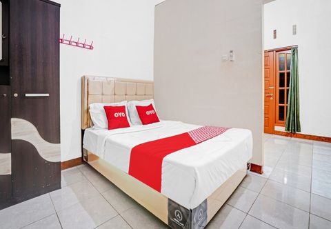 침실 Kusnan Guest House Syariah