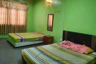 Kamar Tidur OYO HOME 90325 Au Homestay