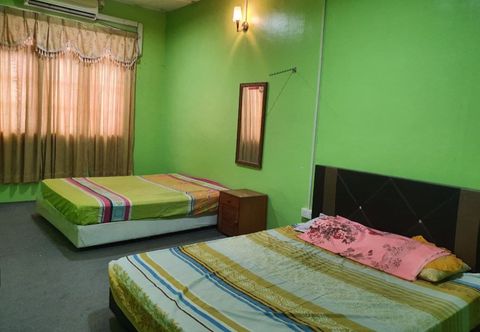 Bedroom OYO HOME 90325 Au Homestay