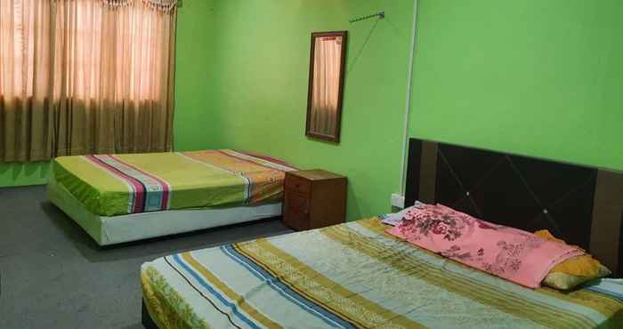 Kamar Tidur OYO HOME 90325 Au Homestay