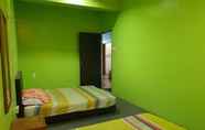 Kamar Tidur 4 OYO HOME 90325 Au Homestay