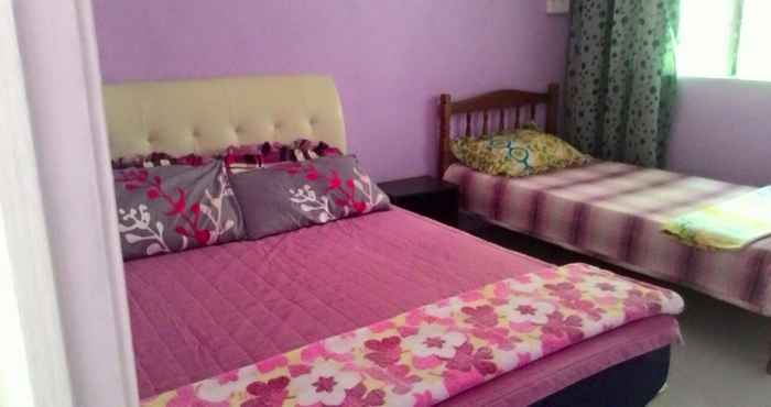 ห้องนอน OYO Home 90335 Merkang Guesthouse