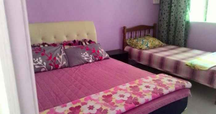 Bedroom OYO Home 90335 Merkang Guesthouse