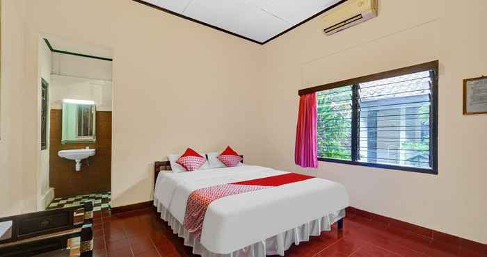 Kamar Tidur OYO 90676 Oryza Hotel