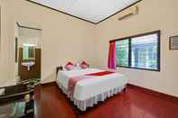 Bedroom OYO 90676 Oryza Hotel