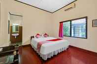 Kamar Tidur OYO 90676 Oryza Hotel