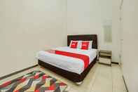 Bedroom OYO 90684 Happy Homestay Syariah