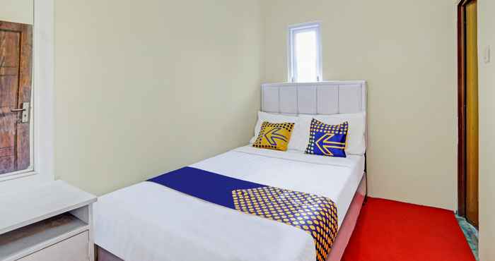 Bedroom SPOT ON 90698 Delfi Homestay Syariah
