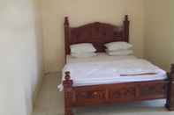 Kamar Tidur OYO 90700 Villa Deris