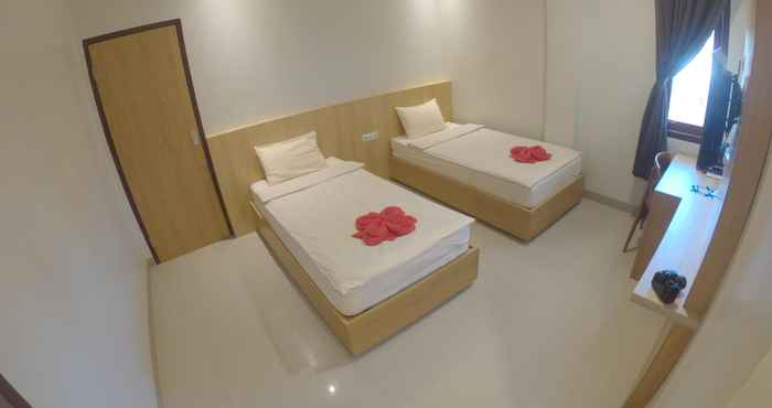 Kamar Tidur Sunnyday Inn Merauke