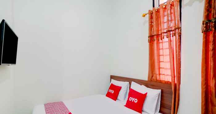 ห้องนอน OYO 90683 Teratai Homestay