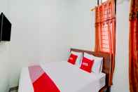 ห้องนอน OYO 90683 Teratai Homestay