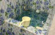 In-room Bathroom 5 Athia homestay syariah