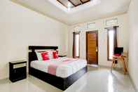 Phòng ngủ OYO 90711 Blembong Homestay