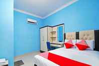 Bedroom OYO 90752 Ridho Guest House Syariah