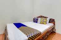 Bedroom SPOT ON 90744 Kost Alika
