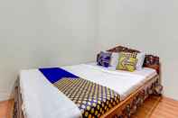 Kamar Tidur SPOT ON 90744 Kost Alika