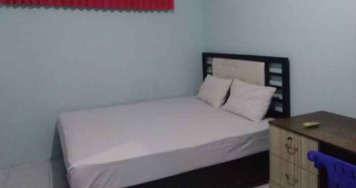 Bilik Tidur OYO 90766 Gardenia Boarding House