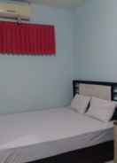 BEDROOM OYO 90766 Gardenia Boarding House