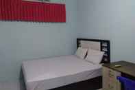 Kamar Tidur OYO 90766 Gardenia Boarding House