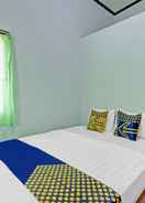 BEDROOM SPOT ON 90760 Homestay Al Madina Syariah