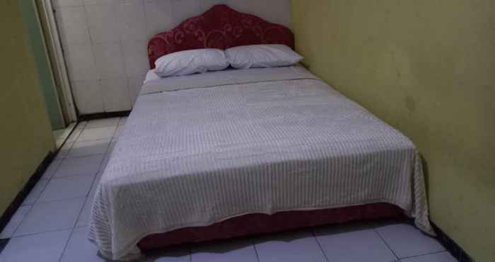 Kamar Tidur OYO 90757 Am'key Villa Tretes 1