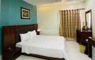 Kamar Tidur 3 Binh Hung Hotel