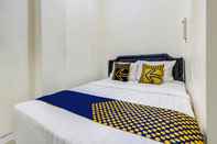 Bedroom SPOT ON 90780 Gang Tengah Homestay Syariah