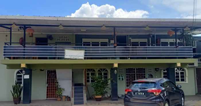 Bangunan OYO Home 90366 Home Valley Guesthouse Tambunan