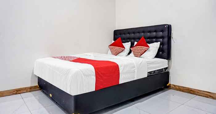 Kamar Tidur OYO 90784 Adelia Syariah Residence