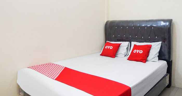 ห้องนอน OYO 90785 Mutiara Guest House