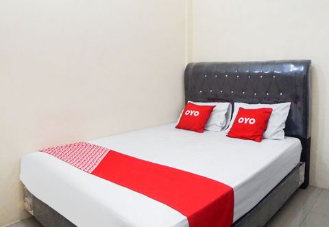 Bedroom OYO 90785 Mutiara Guest House