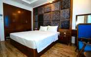Bedroom 3 NewDay Hotel